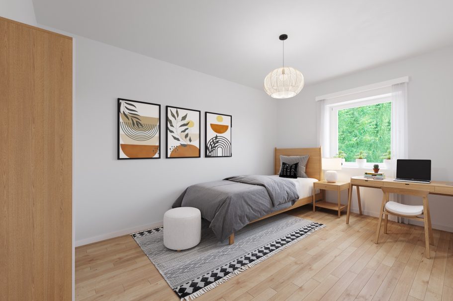 Modern Schlafzimmer mit Bett, Schreibtisch und Fenstern mit Blick ins Grüne.